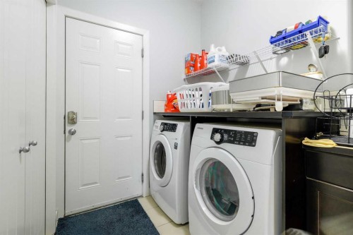 16 Redstone Parade Ne, Calgary, AB - Indoor Photo Showing Laundry Room