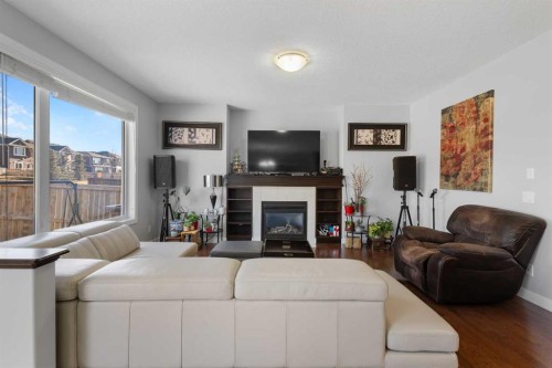 16 Redstone Parade Ne, Calgary, AB - Indoor Photo Showing Living Room With Fireplace