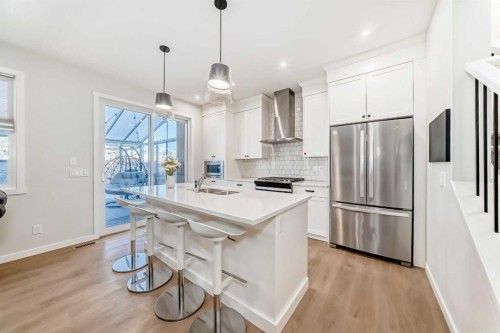 26 Lavender Drive Se, Calgary, AB - Indoor Photo Showing Kitchen With Stainless Steel Kitchen With Double Sink With Upgraded Kitchen