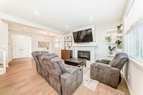 26 Lavender Drive Se, Calgary, AB - Indoor Photo Showing Living Room With Fireplace