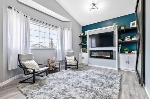 60 Cimarron Meadows Road, Okotoks, AB - Indoor Photo Showing Other Room With Fireplace