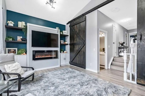 60 Cimarron Meadows Road, Okotoks, AB - Indoor Photo Showing Living Room With Fireplace