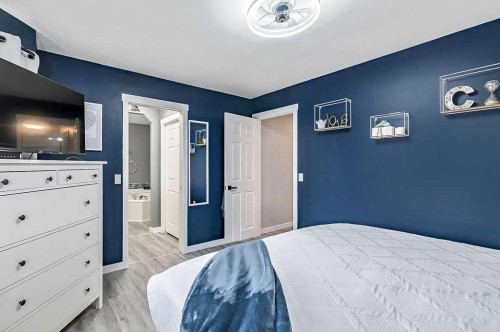 60 Cimarron Meadows Road, Okotoks, AB - Indoor Photo Showing Bedroom