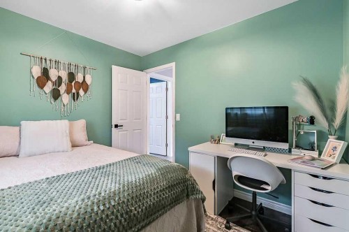 60 Cimarron Meadows Road, Okotoks, AB - Indoor Photo Showing Bedroom