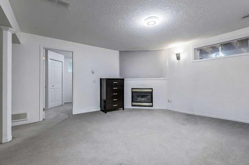 60 Cimarron Meadows Road, Okotoks, AB - Indoor With Fireplace