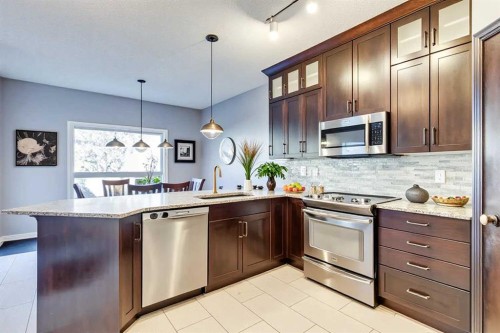 107 Sierra Nevada Close Sw, Calgary, AB - Indoor Photo Showing Kitchen With Stainless Steel Kitchen With Upgraded Kitchen