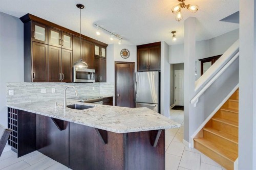 107 Sierra Nevada Close Sw, Calgary, AB - Indoor Photo Showing Kitchen With Upgraded Kitchen