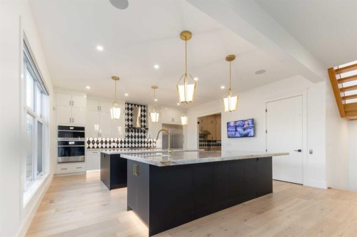 18 Damkar Drive, Rural Rocky View County, AB - Indoor Photo Showing Kitchen With Upgraded Kitchen