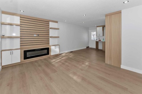 915 Pinecliff Drive Ne, Calgary, AB - Indoor With Fireplace