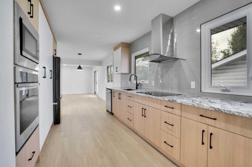 6116 Buckthorn Road Nw, Calgary, AB - Indoor Photo Showing Kitchen With Upgraded Kitchen