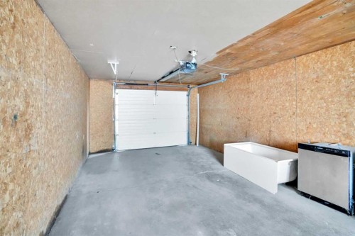 6116 Buckthorn Road Nw, Calgary, AB - Indoor Photo Showing Garage