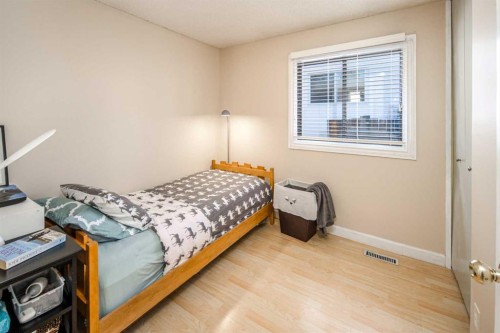 112 Shawmeadows Crescent Sw, Calgary, AB - Indoor Photo Showing Bedroom