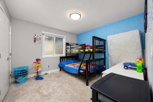 106 Baysprings Gardens Sw, Airdrie, AB - Indoor Photo Showing Bedroom
