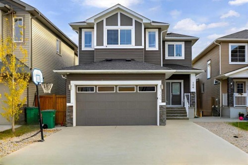 106 Baysprings Gardens Sw, Airdrie, AB - Outdoor With Facade