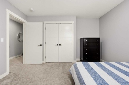 106 Baysprings Gardens Sw, Airdrie, AB - Indoor Photo Showing Bedroom