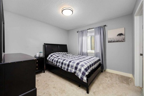 106 Baysprings Gardens Sw, Airdrie, AB - Indoor Photo Showing Bedroom