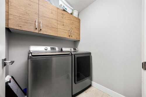 106 Baysprings Gardens Sw, Airdrie, AB - Indoor Photo Showing Laundry Room