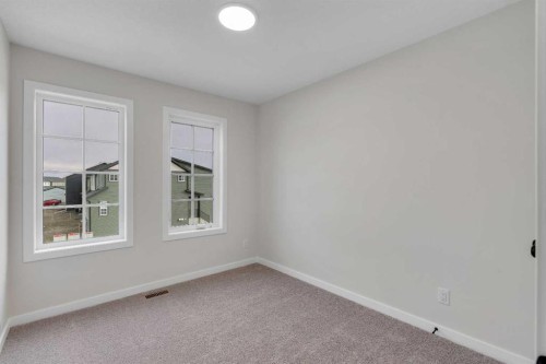 31 Sugarsnap Gardens Se, Calgary, AB - Indoor Photo Showing Other Room