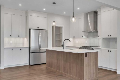 31 Sugarsnap Gardens Se, Calgary, AB - Indoor Photo Showing Kitchen With Upgraded Kitchen