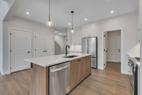 31 Sugarsnap Gardens Se, Calgary, AB - Indoor Photo Showing Kitchen With Upgraded Kitchen