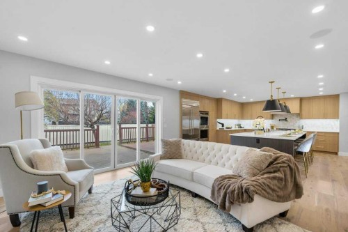 711 Mckenzie Lake Bay Se, Calgary, AB - Indoor Photo Showing Living Room
