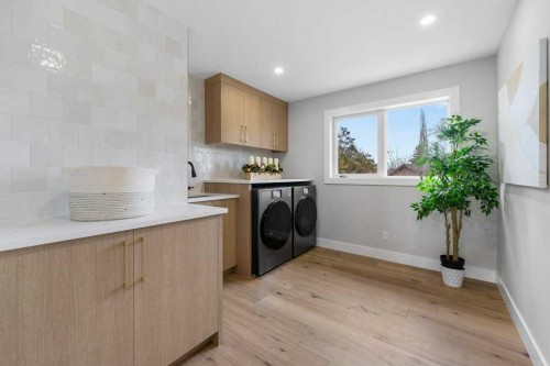711 Mckenzie Lake Bay Se, Calgary, AB - Indoor Photo Showing Laundry Room