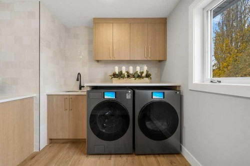 711 Mckenzie Lake Bay Se, Calgary, AB - Indoor Photo Showing Laundry Room