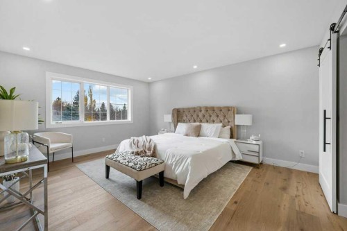 711 Mckenzie Lake Bay Se, Calgary, AB - Indoor Photo Showing Bedroom