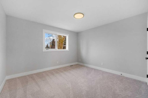 711 Mckenzie Lake Bay Se, Calgary, AB - Indoor Photo Showing Other Room
