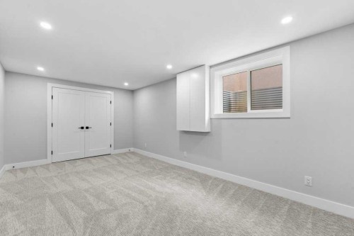 711 Mckenzie Lake Bay Se, Calgary, AB - Indoor Photo Showing Other Room
