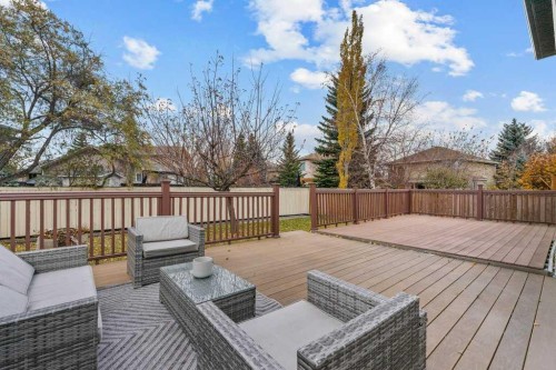 711 Mckenzie Lake Bay Se, Calgary, AB - Outdoor With Deck Patio Veranda