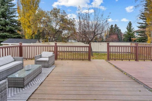 711 Mckenzie Lake Bay Se, Calgary, AB - Outdoor With Deck Patio Veranda With Exterior