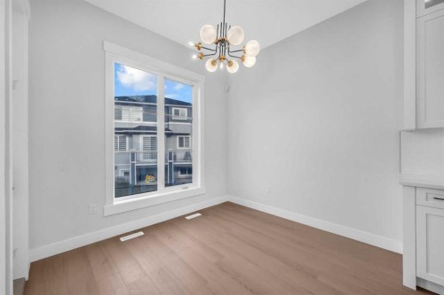 203 Kinniburgh Place, Chestermere, AB - Indoor Photo Showing Other Room