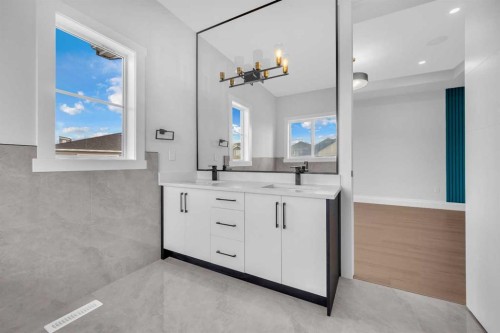 203 Kinniburgh Place, Chestermere, AB - Indoor Photo Showing Bathroom