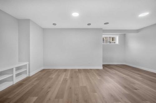 203 Kinniburgh Place, Chestermere, AB - Indoor Photo Showing Other Room