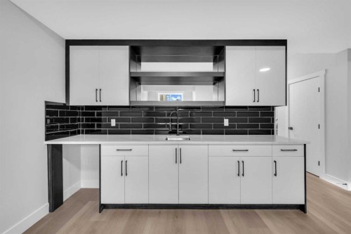 203 Kinniburgh Place, Chestermere, AB - Indoor Photo Showing Kitchen