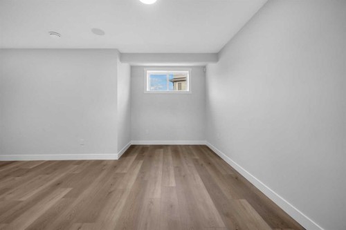 203 Kinniburgh Place, Chestermere, AB - Indoor Photo Showing Other Room