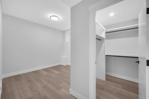 203 Kinniburgh Place, Chestermere, AB - Indoor Photo Showing Other Room