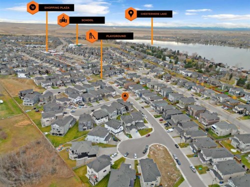 203 Kinniburgh Place, Chestermere, AB - Outdoor With Body Of Water With View