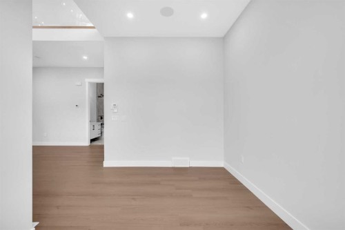 203 Kinniburgh Place, Chestermere, AB - Indoor Photo Showing Other Room