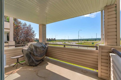 2107-7451 Springbank Boulevard Sw, Calgary, AB - Outdoor With Exterior