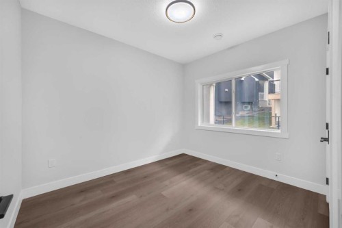 327 Kinniburgh Place, Chestermere, AB - Indoor Photo Showing Other Room