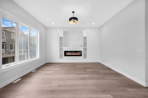 327 Kinniburgh Place, Chestermere, AB - Indoor With Fireplace