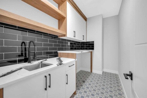 327 Kinniburgh Place, Chestermere, AB - Indoor Photo Showing Kitchen