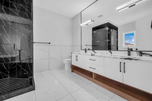 327 Kinniburgh Place, Chestermere, AB - Indoor Photo Showing Bathroom