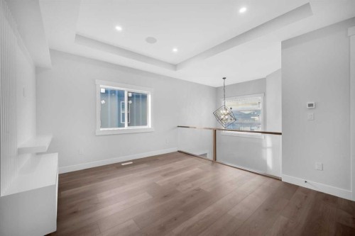 327 Kinniburgh Place, Chestermere, AB - Indoor Photo Showing Other Room