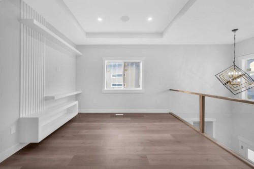 327 Kinniburgh Place, Chestermere, AB - Indoor Photo Showing Other Room