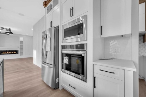 327 Kinniburgh Place, Chestermere, AB - Indoor Photo Showing Kitchen