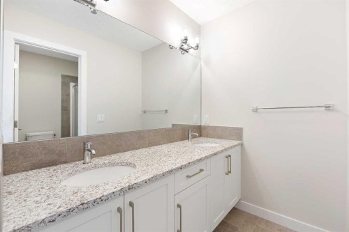 59 Agate Road, Cochrane, AB - Indoor Photo Showing Bathroom