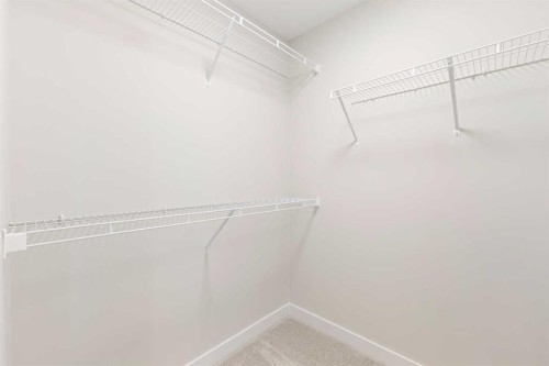 59 Agate Road, Cochrane, AB - Indoor With Storage